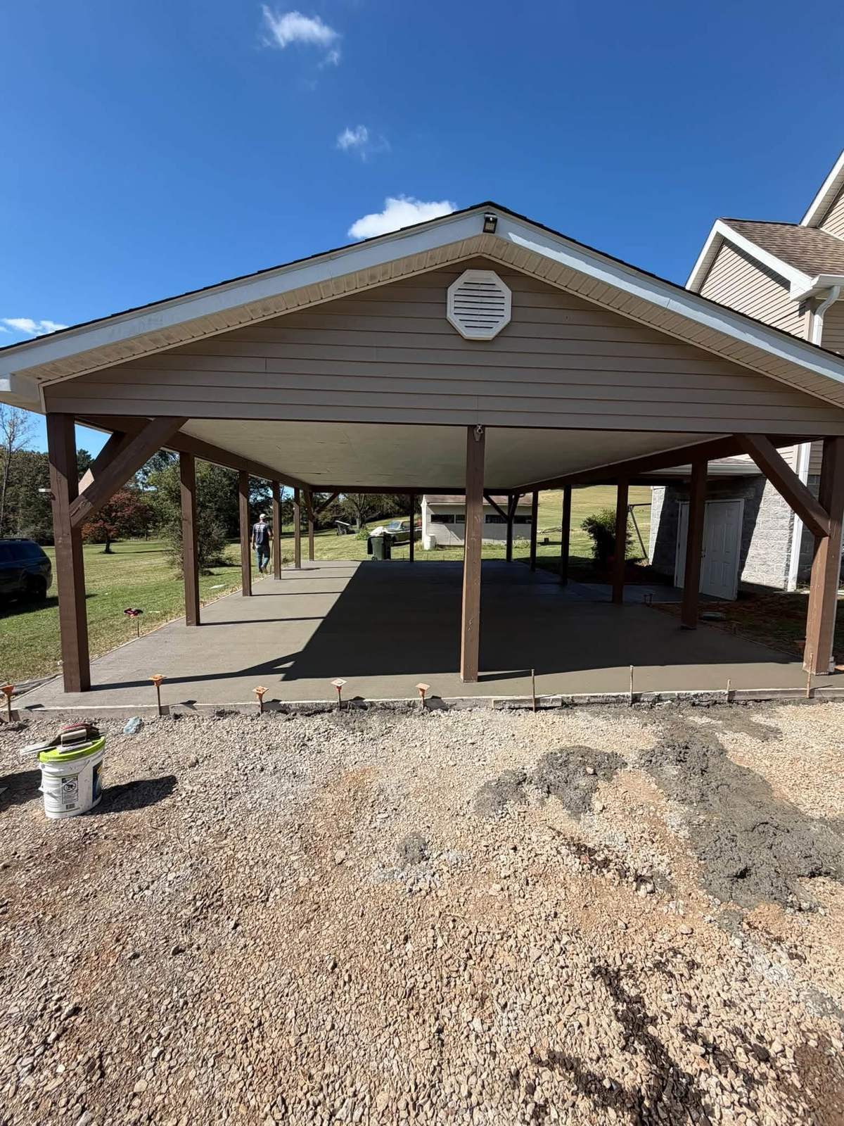 The same carport with a finished concrete slab in place