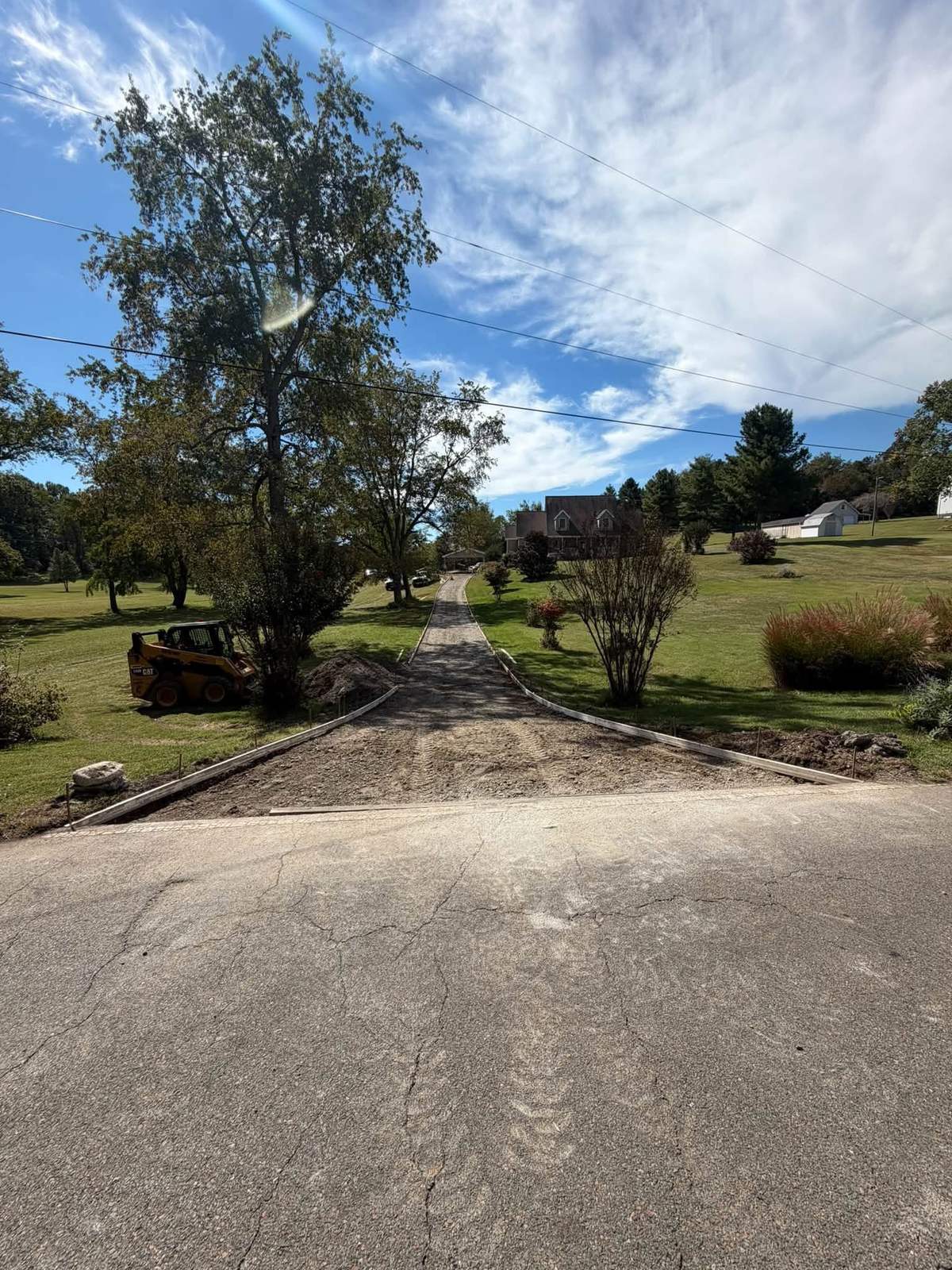 Forms and gravel base prepared for a residential driveway pour